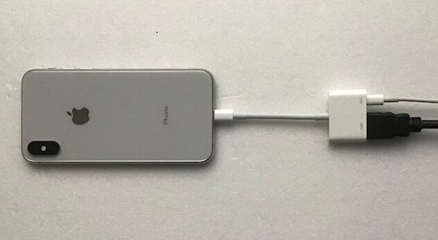 Connect Lightning cable of the adapter to your iPhone
